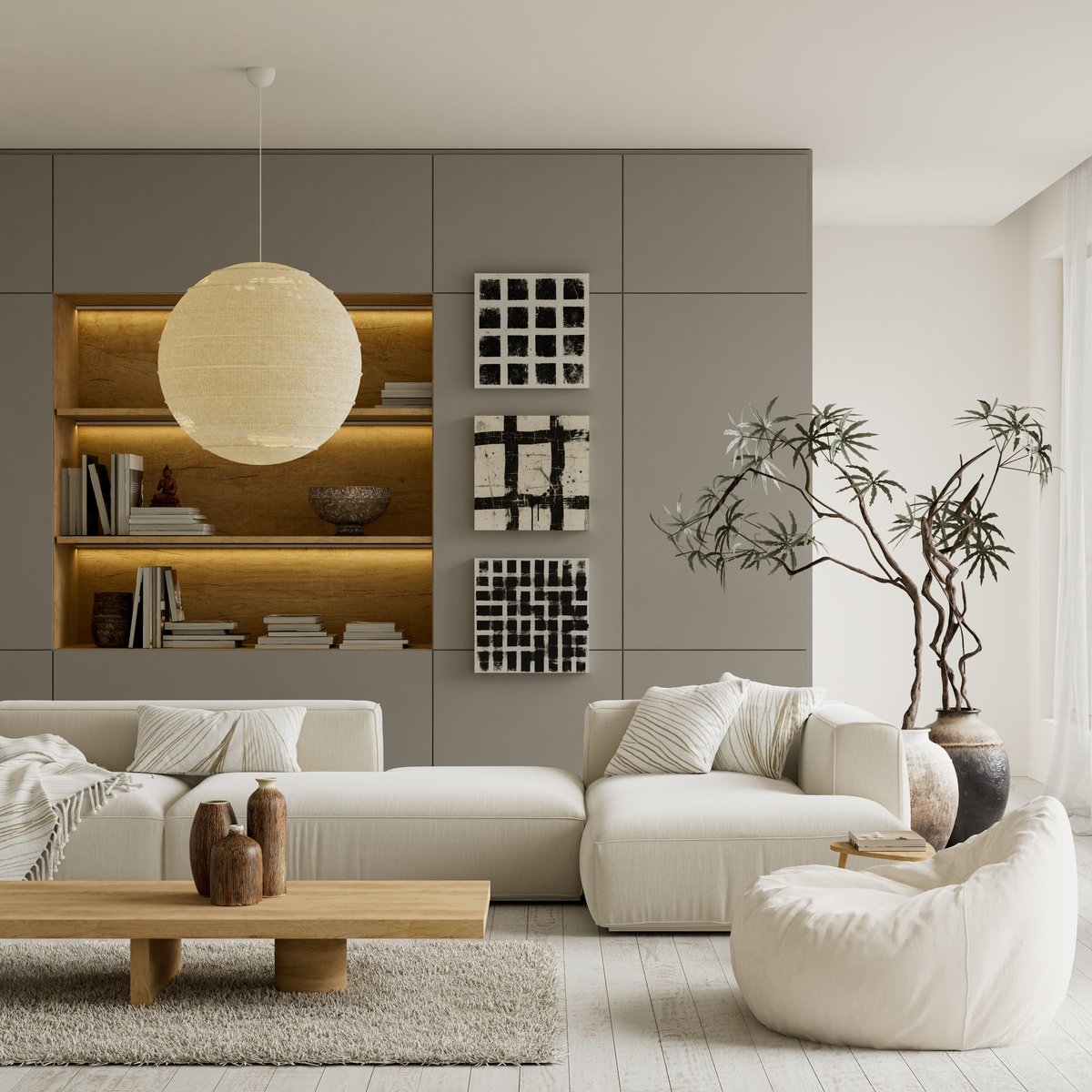 A calm, contemporary living room with neutral tones and soft daylight
